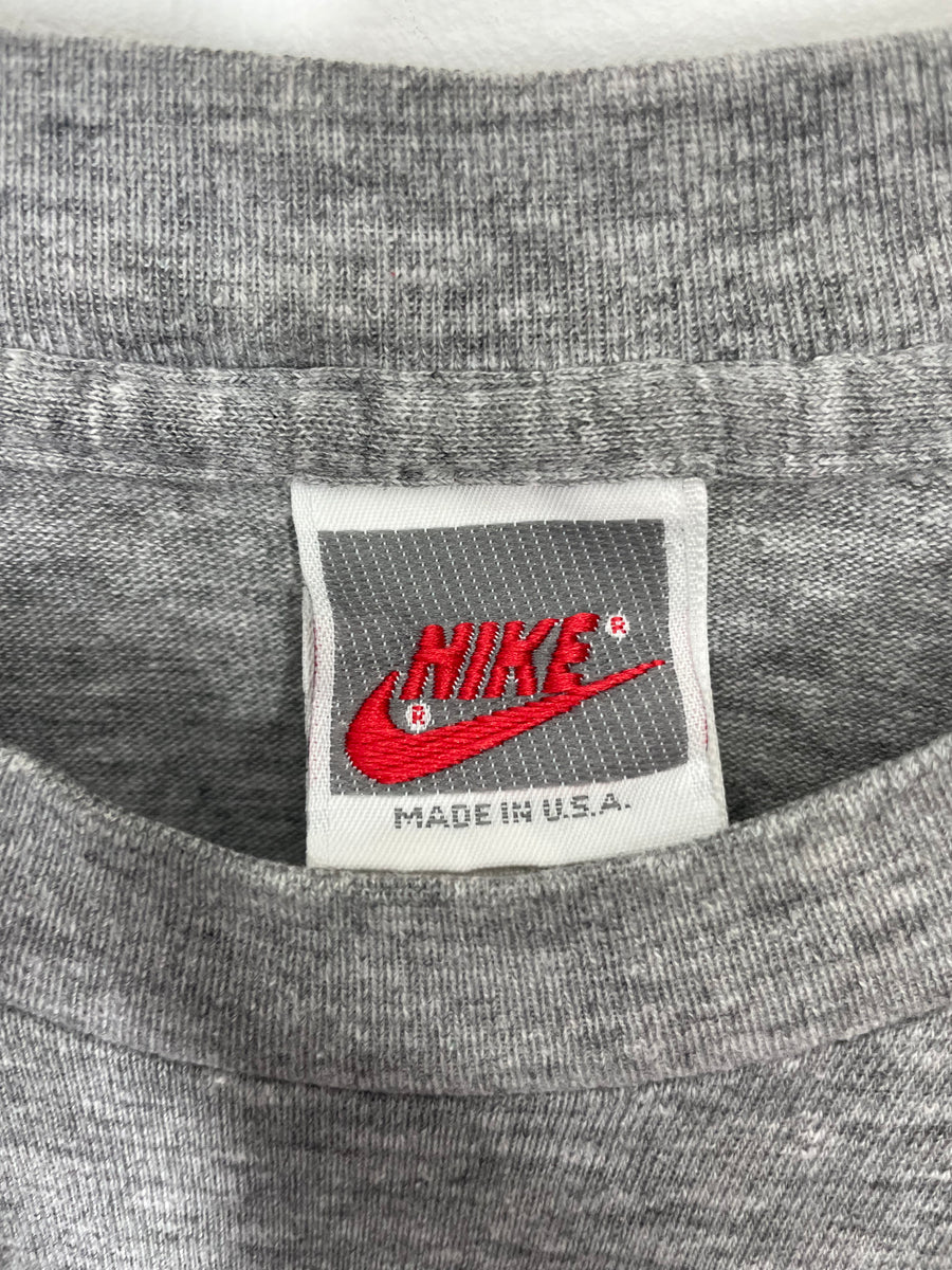 Nike t shirt tag hot sale